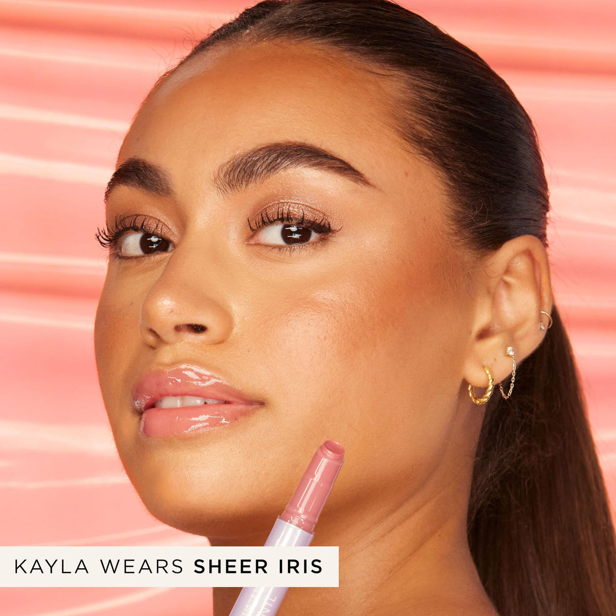 tarte Maracuja Juicy Lip Vinyl Gloss swatch on skin