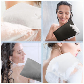 Tatuo exfoliating mitts laid out on a towel