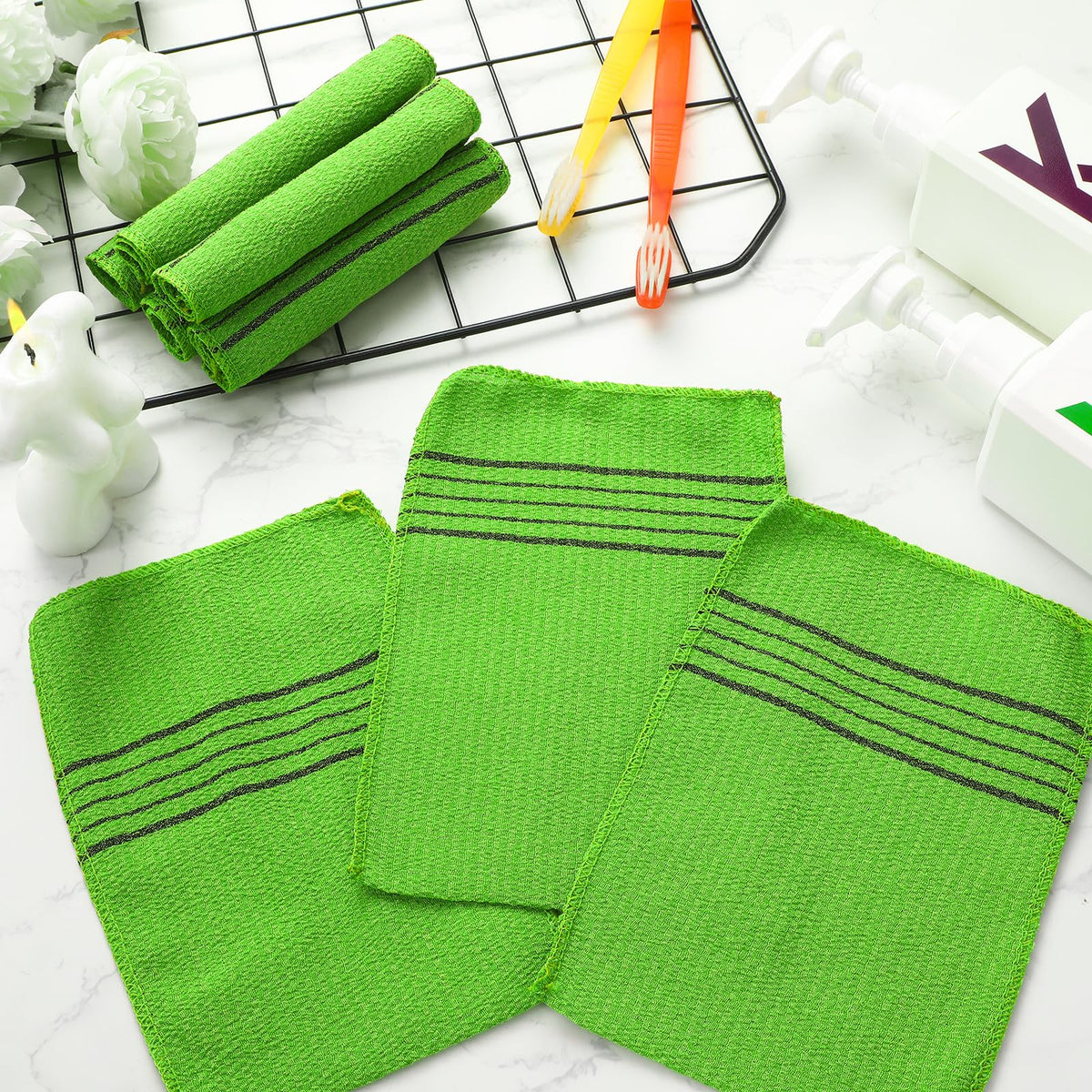 Tatuo exfoliating mitts with packaging