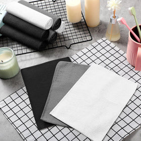 Tatuo exfoliating mitts with packaging details