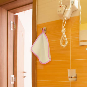 Tatuo Exfoliating Washcloths in a travel bag