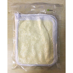 Tatuo washcloths stacked neatly on a bathroom shelf
