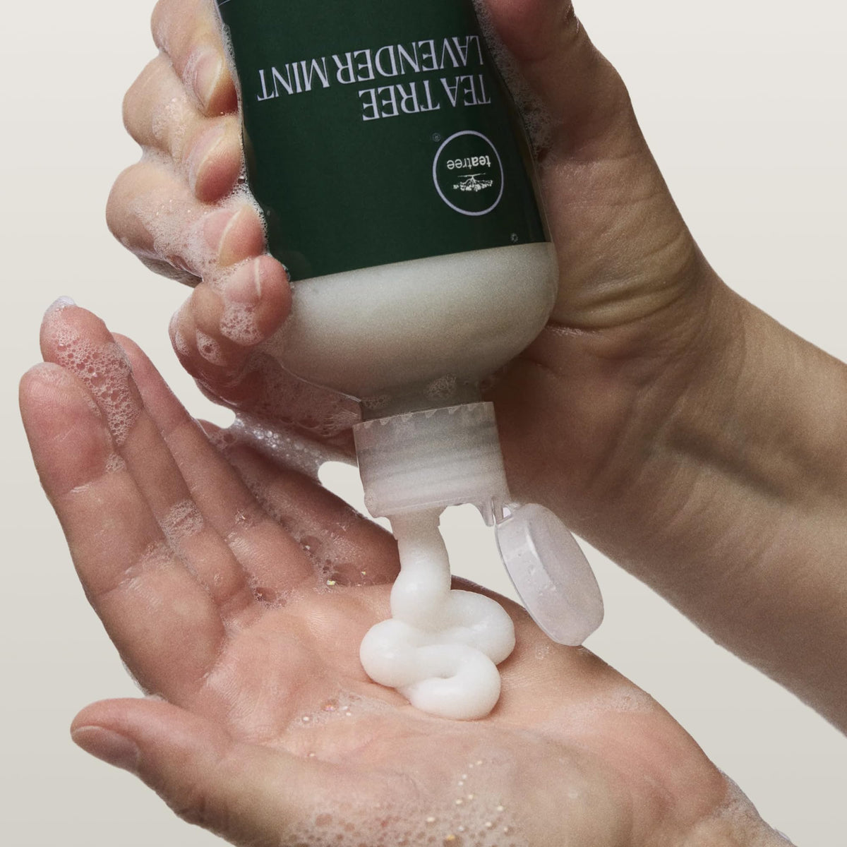 Tea Tree Lavender Mint Moisturizing Conditioner with lavender and mint leaves