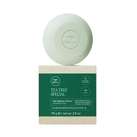 Tea Tree Special Shampoo Bar front view, solid disc shape