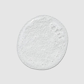 Tea Tree Thickening Shampoo in a bathroom setting