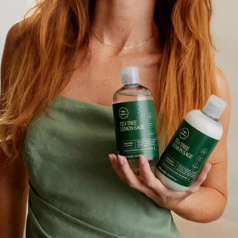 Tea Tree Thickening Shampoo on a bathroom shelf