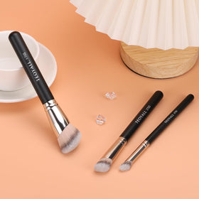 TEOYALL angled brush applying foundation on skin