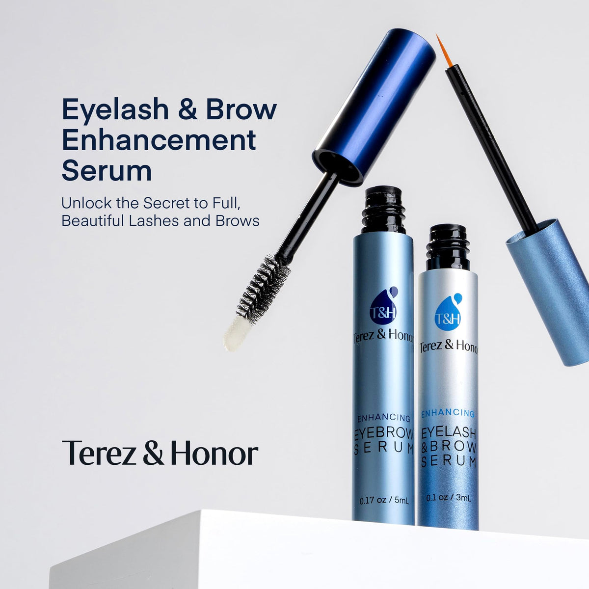 TEREZ & HONOR Eyebrow Growth Serum on a vanity with makeup tools