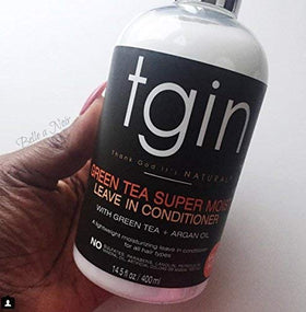 Thank God It's Natural Green Tea Leave In Conditioner being applied to hair