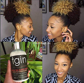 Thank God It's Natural Green Tea Leave In Conditioner on a bathroom shelf
