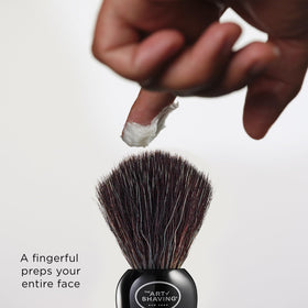 The Art of Shaving Sandalwood Shaving Cream on a bathroom counter