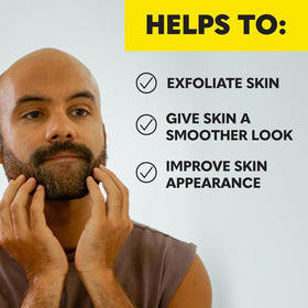 The Beard Club Derma Roller and cleansing spray on a wooden surface