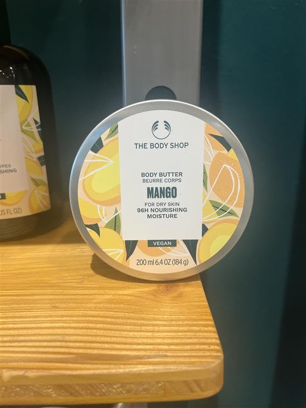 The Body Shop Mango Body Butter with a focus on its rich texture