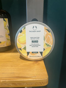The Body Shop Mango Body Butter with a focus on its rich texture