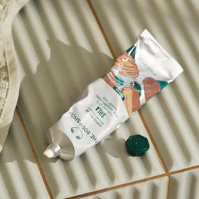 The Body Shop Shea Hand Balm in a handbag