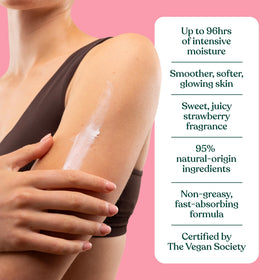 The Body Shop Strawberry Body Butter 240g on a wooden surface