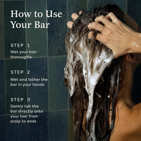 The Earthling Co. Volumizing Shampoo Bar on a soap dish