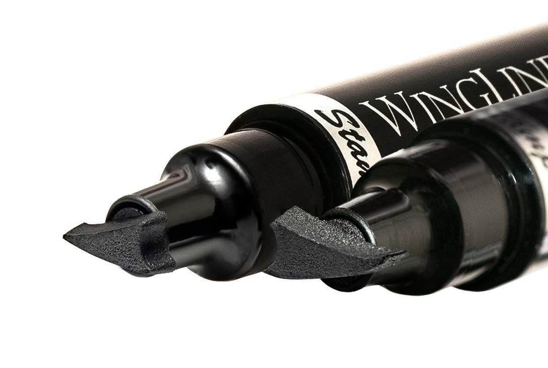 The Flick Stick Winged Eyeliner Stamp Midnight Black in hand
