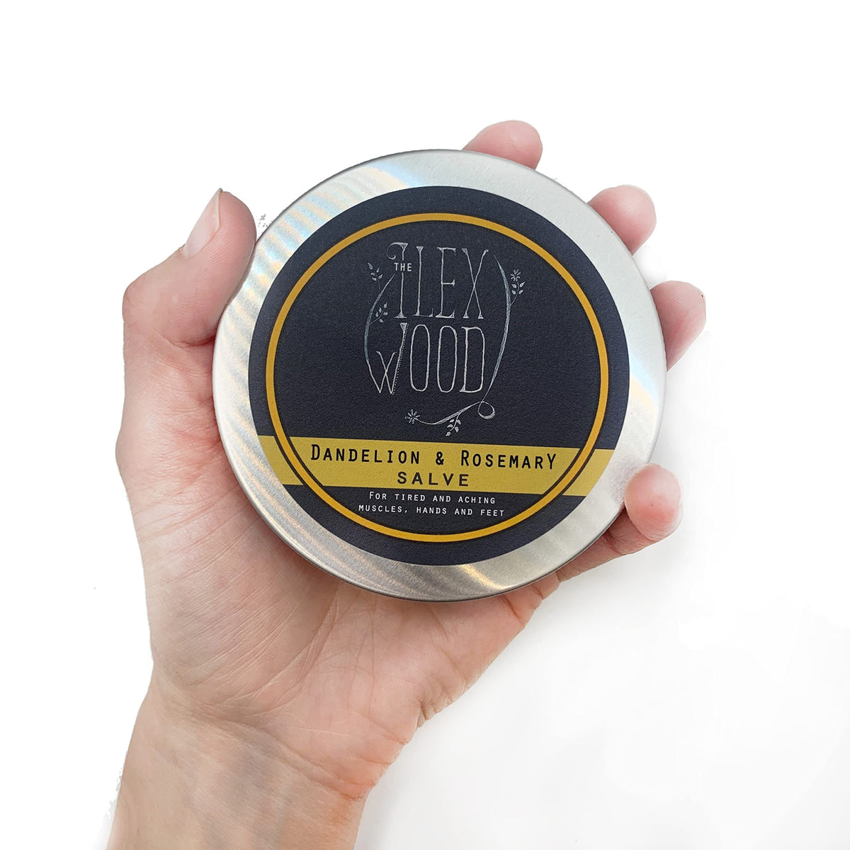 The Ilex Wood Dandelion & Rosemary Natural Salve opened showing the balm