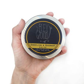 The Ilex Wood Dandelion & Rosemary Natural Salve opened showing the balm