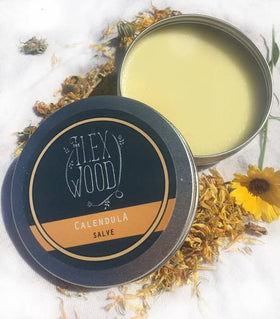 The Ilex Wood Vegan Calendula Salve 100ml in a natural setting