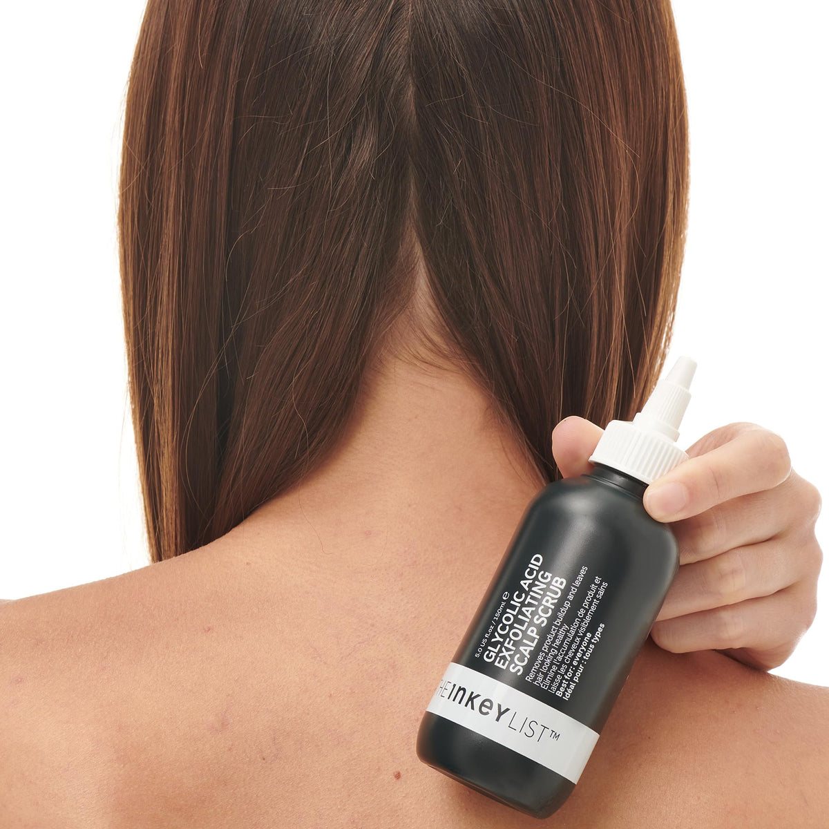 The INKEY List Glycolic Acid Scalp Scrub in bathroom setting