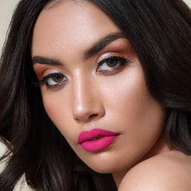 The Lip Bar Liquid Matte Lipstick Fuchsia Big Gretch in hand
