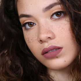 The Lip Bar Nonstop Liquid Matte Lipstick Curlfriend applied on lips