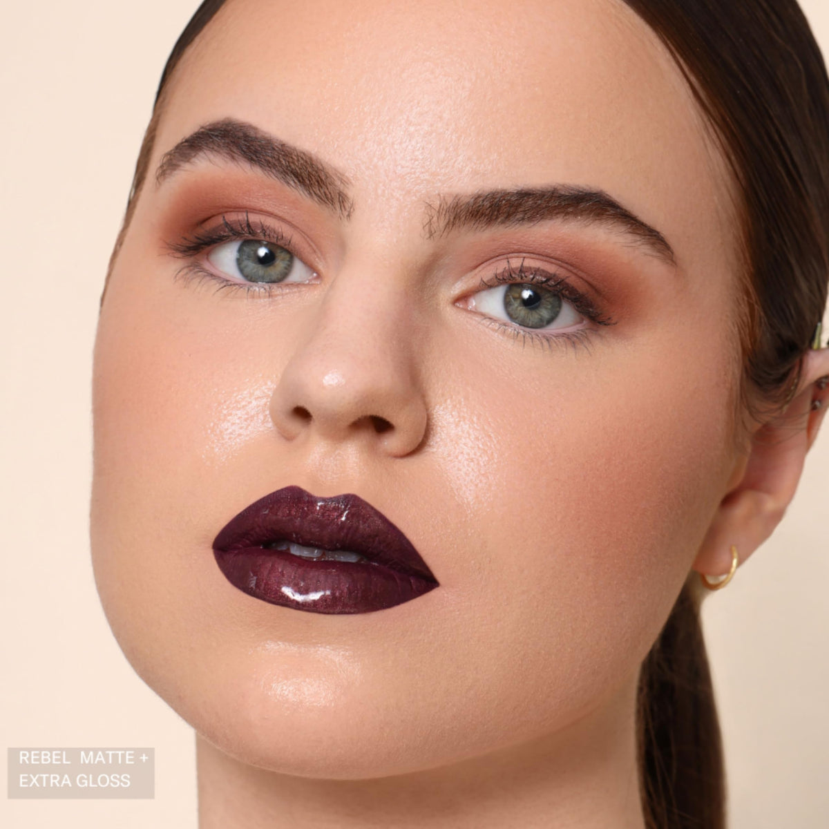 The Lip Bar Nonstop Liquid Matte Lipstick Rebel Deep Burgundy with lip gloss