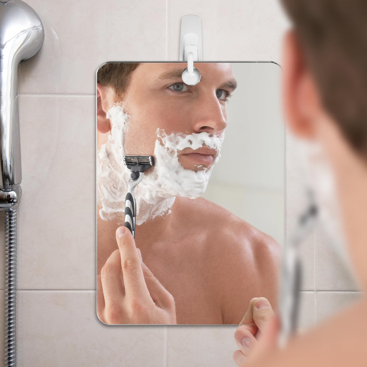 The Shave Well Company X-Large Anti-Fog Shaving Mirror handheld view