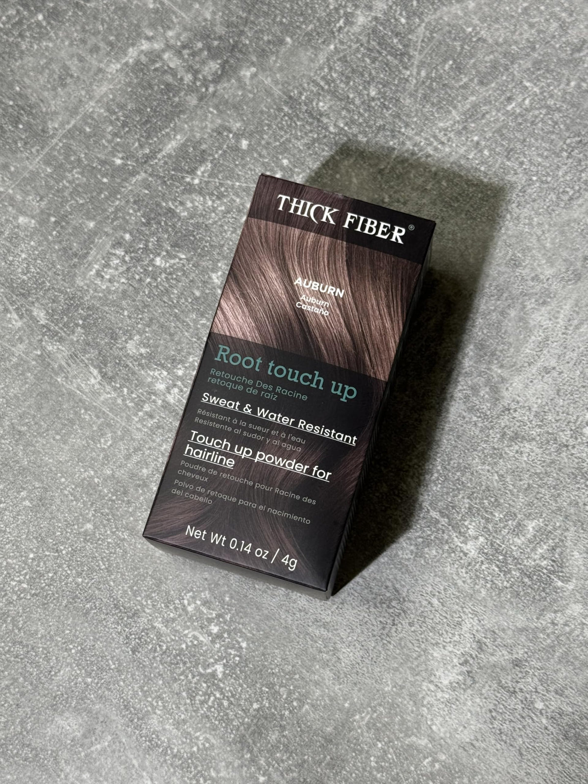 Thick Fiber Root Touch Up Powder texture close-up