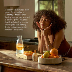 Third Layer Day Spray Body Oil on a wooden surface with natural elements