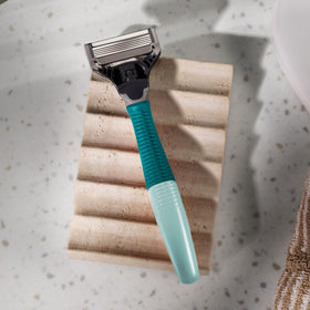Three Harry's razor blade refills displayed on a white background