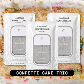Three Touchland hand sanitizer sprays in Confetti Cake scent