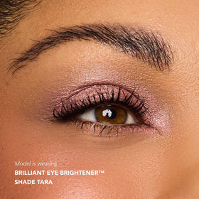 Thrive Causemetics Brilliant Eye Brightener Stick in use on eyelids