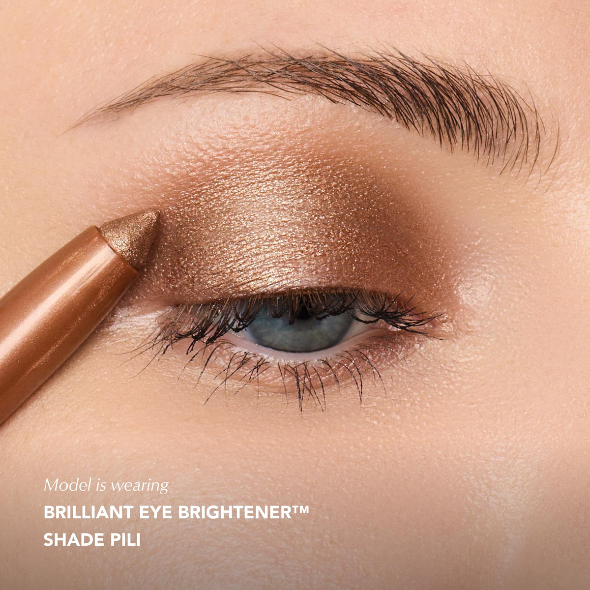 Thrive Causemetics Brilliant Eye Brightener Stick with natural light reflection