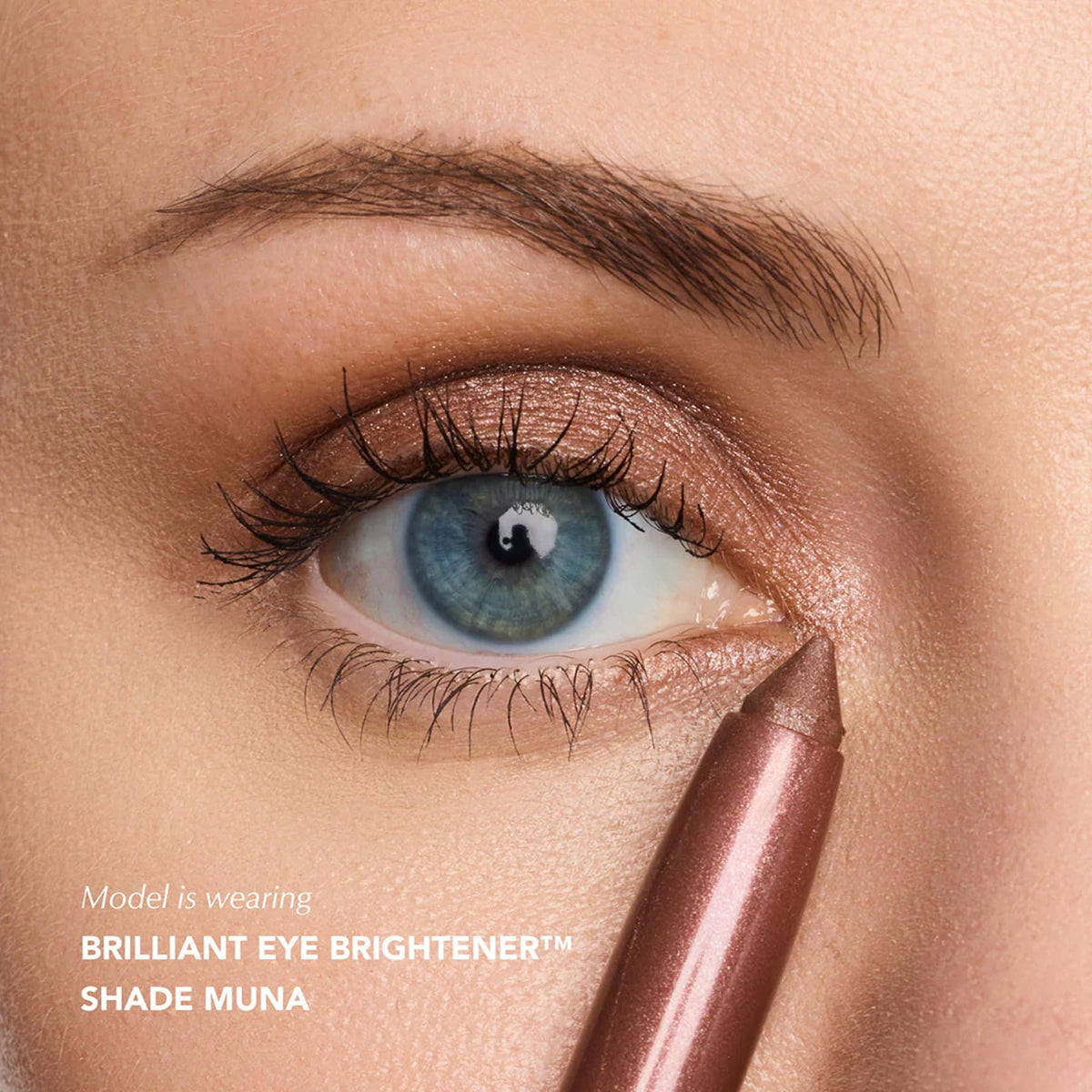 Thrive Causemetics eye brightener on cheekbones as highlighter