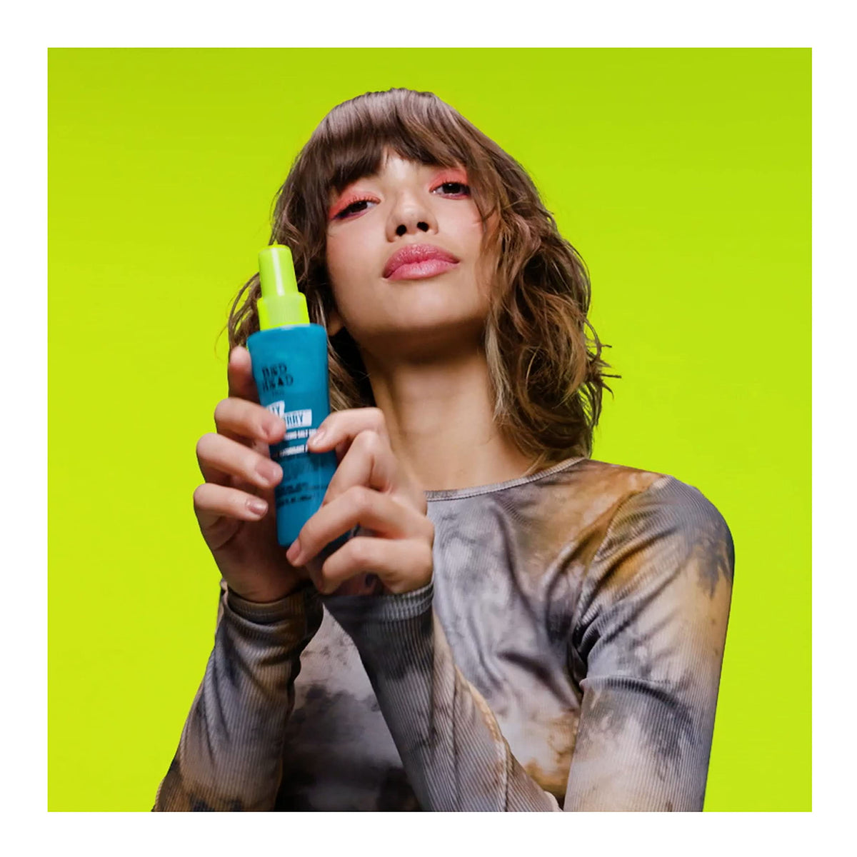 TIGI Salty Not Sorry Texturizing Salt Spray on styled hair