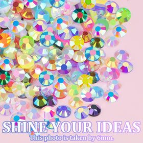 TINKRSTUFF rhinestones and tools on a crafting table