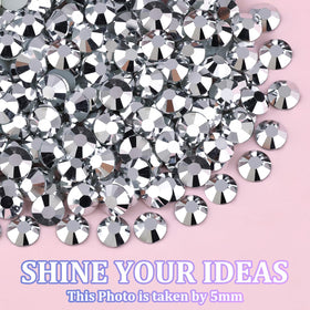 TINKRSTUFF rhinestones displayed on a colorful background