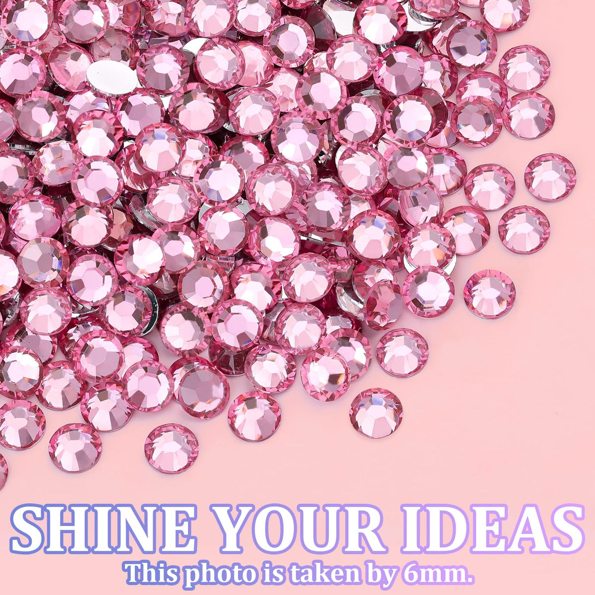 TINKRSTUFF rhinestones showcased in a creative nail art design