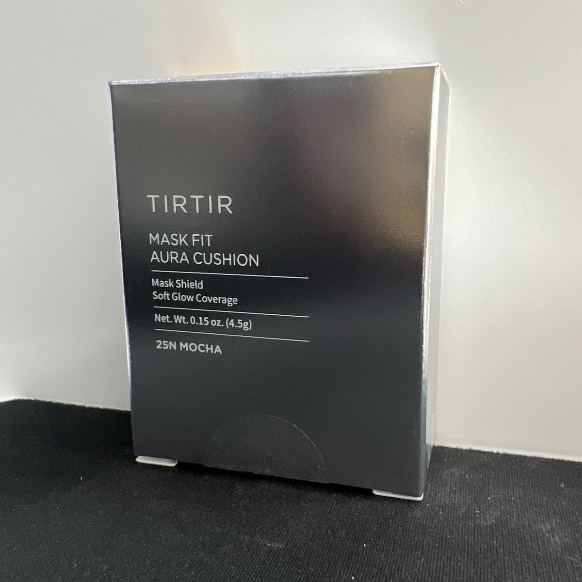 TIRTIR Aura Glow Cushion Foundation #25N Mocha with makeup accessories