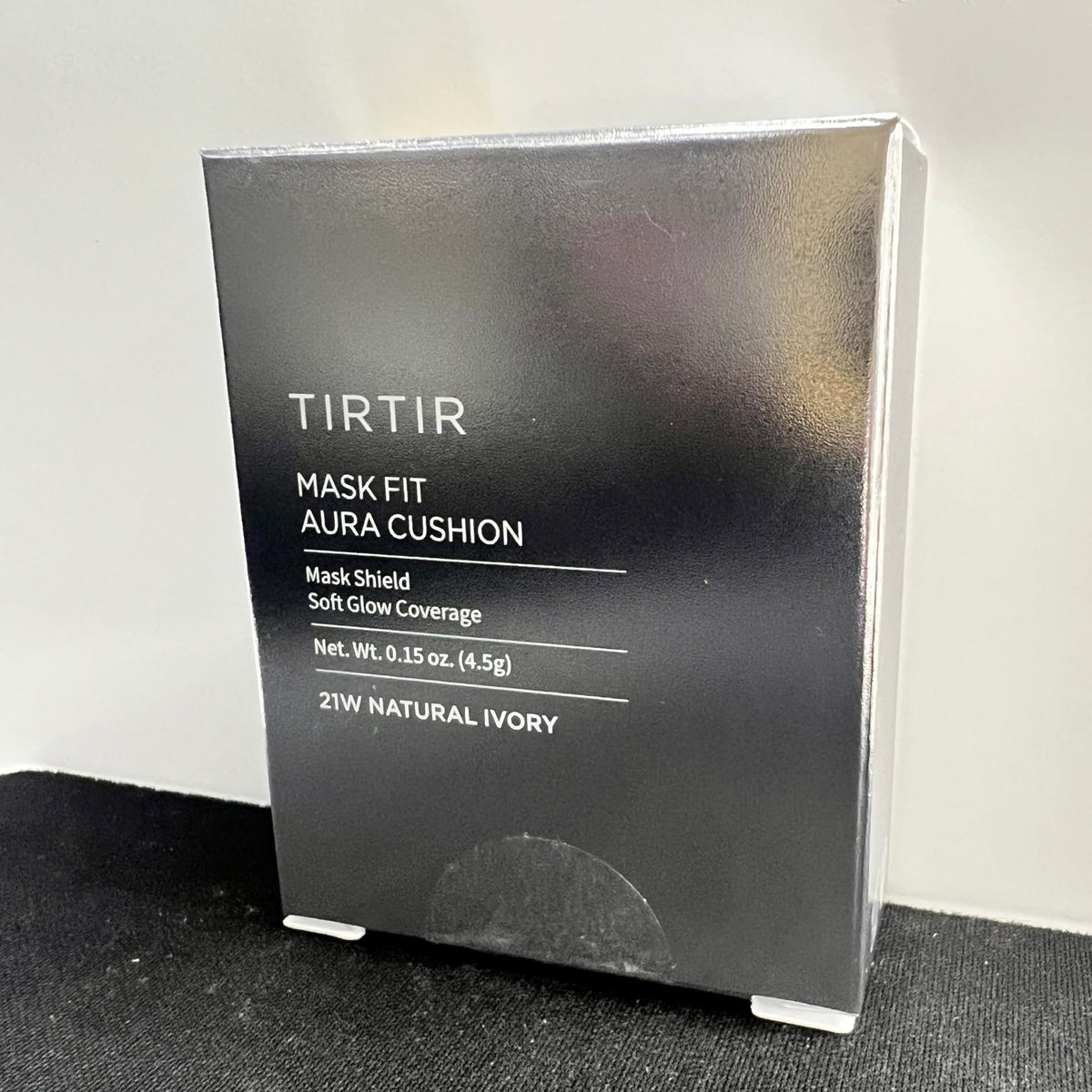 TIRTIR Aura Glow Cushion Foundation lifestyle scene with makeup products