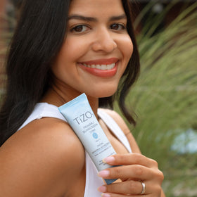TIZO Facial Mineral Sunscreen Primer Tinted SPF 40 in a bathroom setting