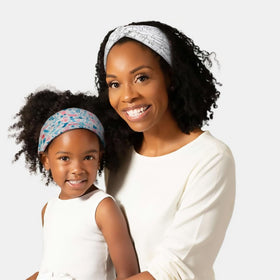 Tobeffect Extra Wide Turban Headband worn by a model with long hair