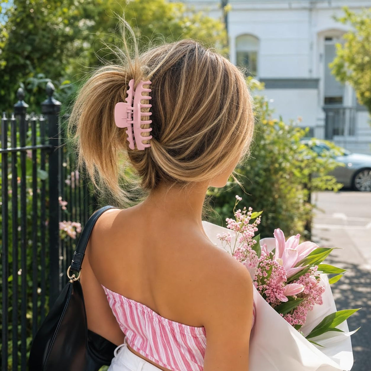 TOCESS Jumbo Hair Claw Clip in Pink, on a vanity