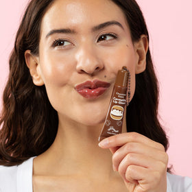 TONYMOLY Lip Gloss Duo on a festive background