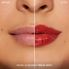 Too Faced Lip Injection Extreme Plumping Clicks in hand for application demonstration