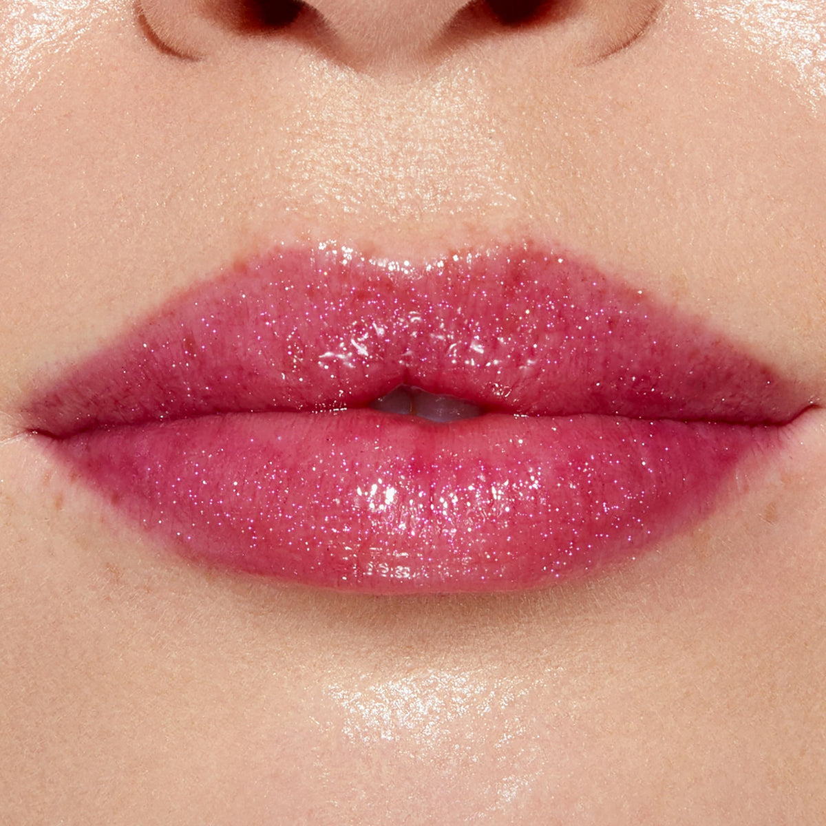 Too Faced Lip Injection Lip Gloss in hand showing size