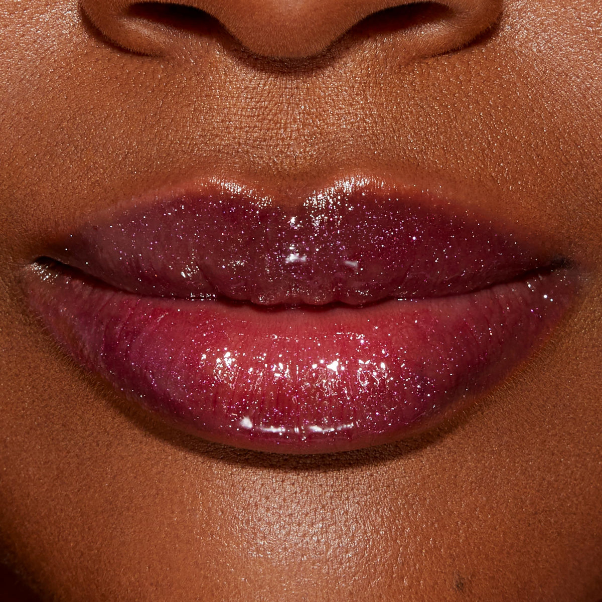 Too Faced Lip Injection Lip Gloss side view showcasing texture
